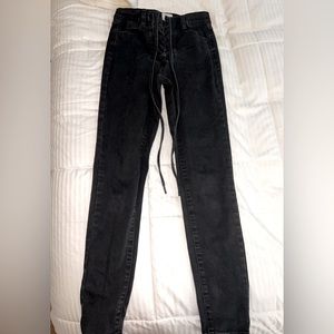 Black tie up skinny jeans GARAGE